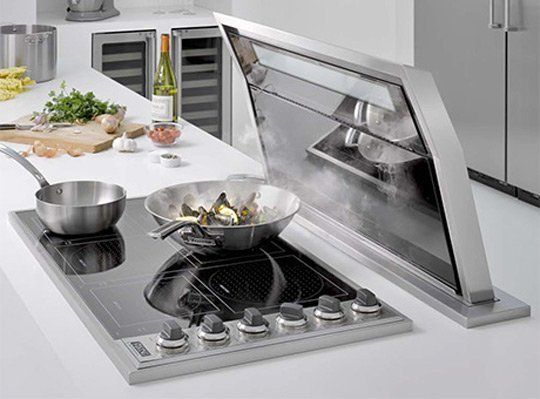 A cooktop with downdraft vent