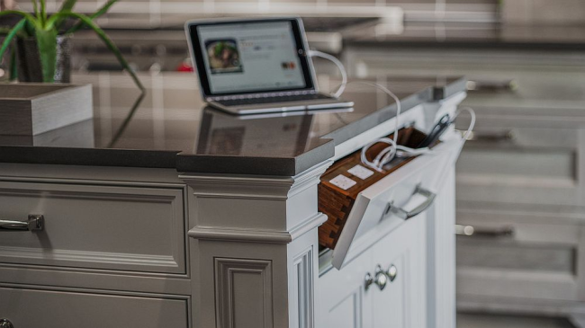 Pop-up outlets for appliances or charging devices