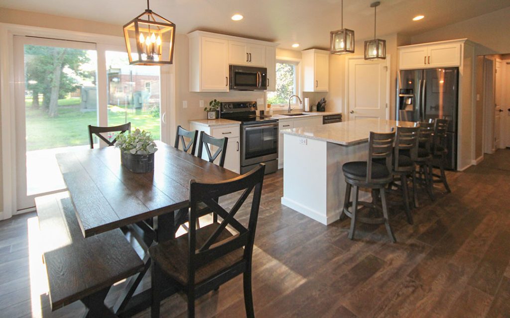 Remove walls between kitchen and dining for an open concept remodel