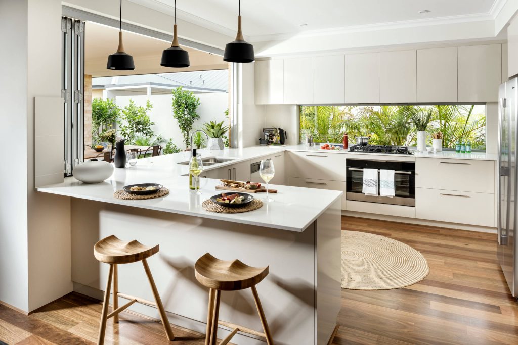 U-Shaped Kitchen with Bifold Windows