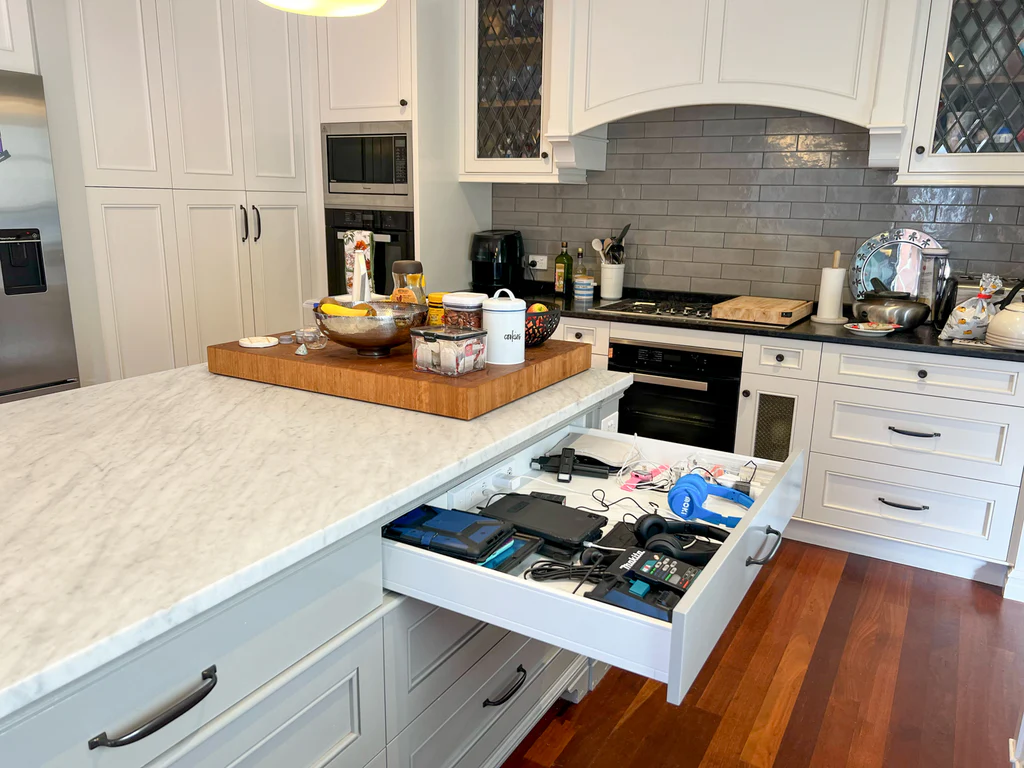 Hidden charging drawers