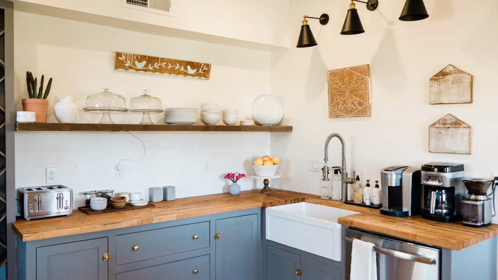 Cluttered countertops and open shelves